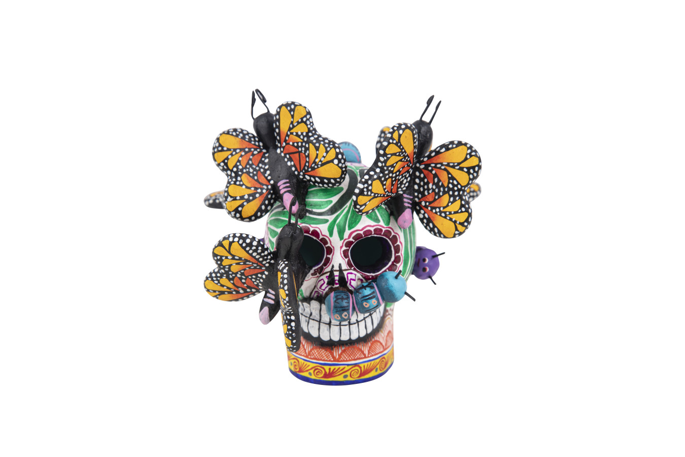 Craneo chi mariposa - mała czaszka, sztuka folkowa Meksyk
